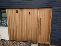Creative use of Western Red Cedar on garage and door